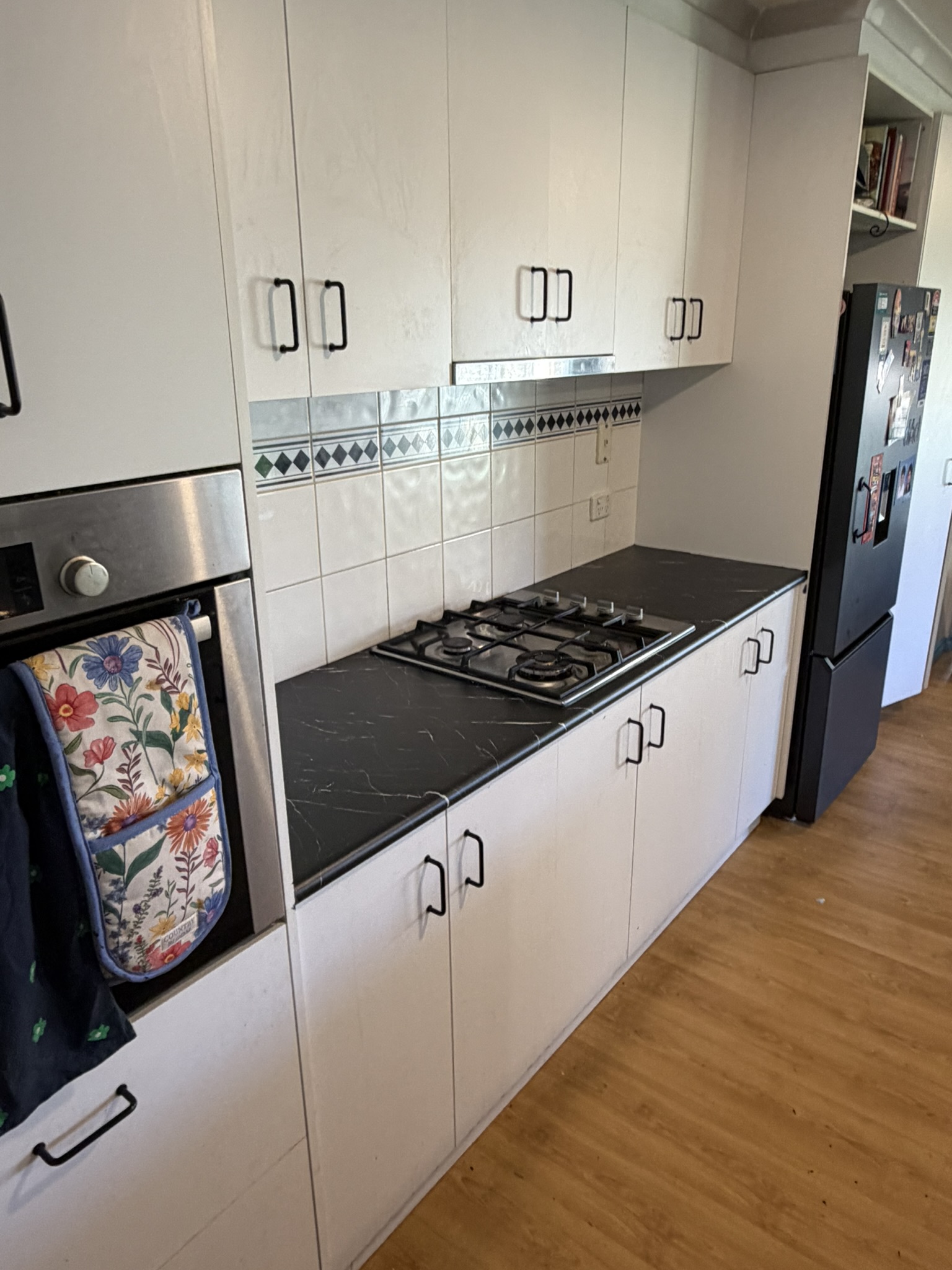 Matte-black marble kitchen — before